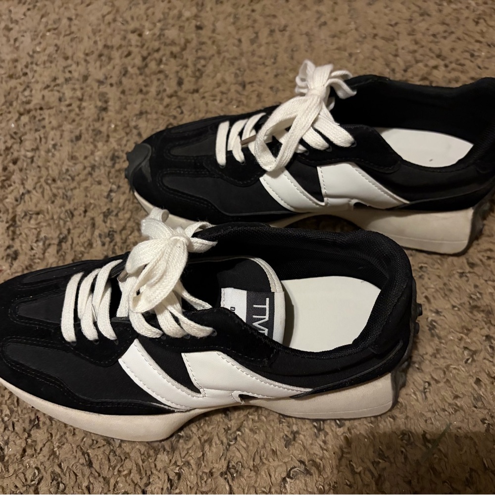 New Balance Black and White Athletic Shoes